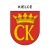 Naklejka z herbem Kielc i napisem Kielce nad herbem, herb i napis posiadają białą obwódkę, która jest białym tłem dla herbu Kielc i napisu. Wymiar naklejki 12 cm wysokości.