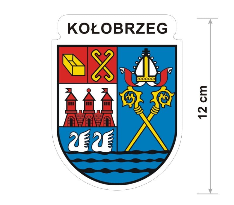 Naklejka z herbem Kołobrzegu, nad herbem jest umieszczony napis Kołobrzeg. Herb wraz z nazwą otoczone są białą obwódką stanowiącą białe tło naklejki. Obok podano wymiar wysokości naklejki - 12 cm.