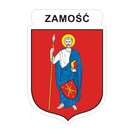Naklejka z herbem Zamościa i napisem Zamość nad herbem, herb i napis posiadają białą obwódkę, która jest białym tłem dla herbu Zamościa i napisu. Wymiar naklejki 12 cm wysokości.