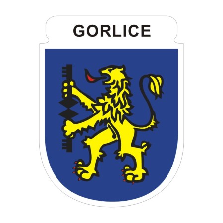 Naklejka z herbem Gorlic i napisem Gorlice nad herbem, herb i napis posiadają białą obwódkę, która jest białym tłem dla herbu Gorlic i napisu. Wymiar naklejki 12 cm wysokości.