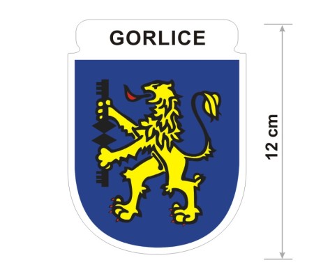 Naklejka z herbem Gorlic, nad herbem jest umieszczony napis Gorlice. Herb wraz z nazwą otoczone są białą obwódką stanowiącą białe tło naklejki. Obok podano wymiar wysokości naklejki - 12 cm.