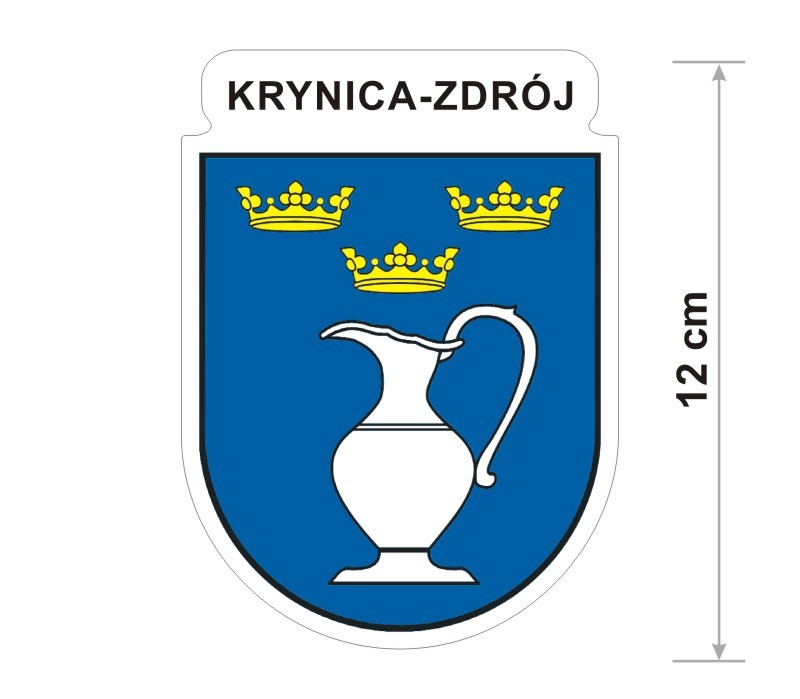 Naklejka z herbem Krynicy Zdroju, nad herbem jest umieszczony napis Krynica Zdrój. Herb wraz z nazwą otoczone są białą obwódką stanowiącą białe tło naklejki. Obok podano wymiar wysokości naklejki - 12 cm.