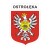 Naklejka z herbem Ostrołęki i napisem Ostrołęka nad herbem, herb i napis posiadają białą obwódkę, która jest białym tłem dla herbu Ostrołęki i napisu. Wymiar naklejki 12 cm wysokości.