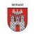 Naklejka z herbem Sieradza i napisem Sieradz nad herbem, herb i napis posiadają białą obwódkę, która jest białym tłem dla herbu Sieradza i napisu. Wymiar naklejki 12 cm wysokości.