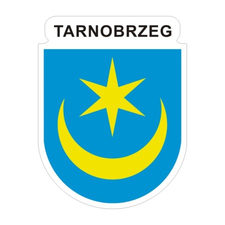 Naklejka z herbem Tarnobrzega i napisem Tarnobrzeg nad herbem, herb i napis posiadają białą obwódkę, która jest białym tłem dla herbu Tarnobrzega i napisu. Wymiar naklejki 12 cm wysokości.