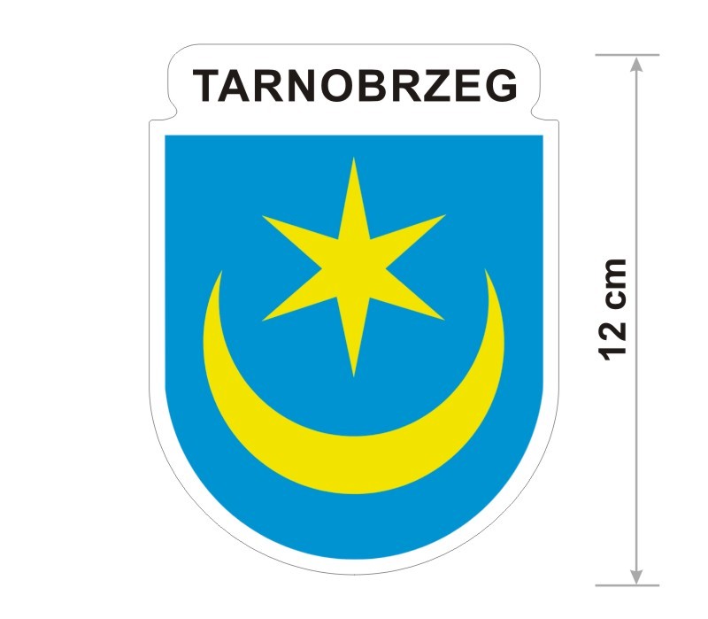 Naklejka z herbem Tarnobrzega, nad herbem jest umieszczony napis Tarnobrzeg. Herb wraz z nazwą otoczone są białą obwódką stanowiącą białe tło naklejki. Obok podano wymiar wysokości naklejki - 12 cm.