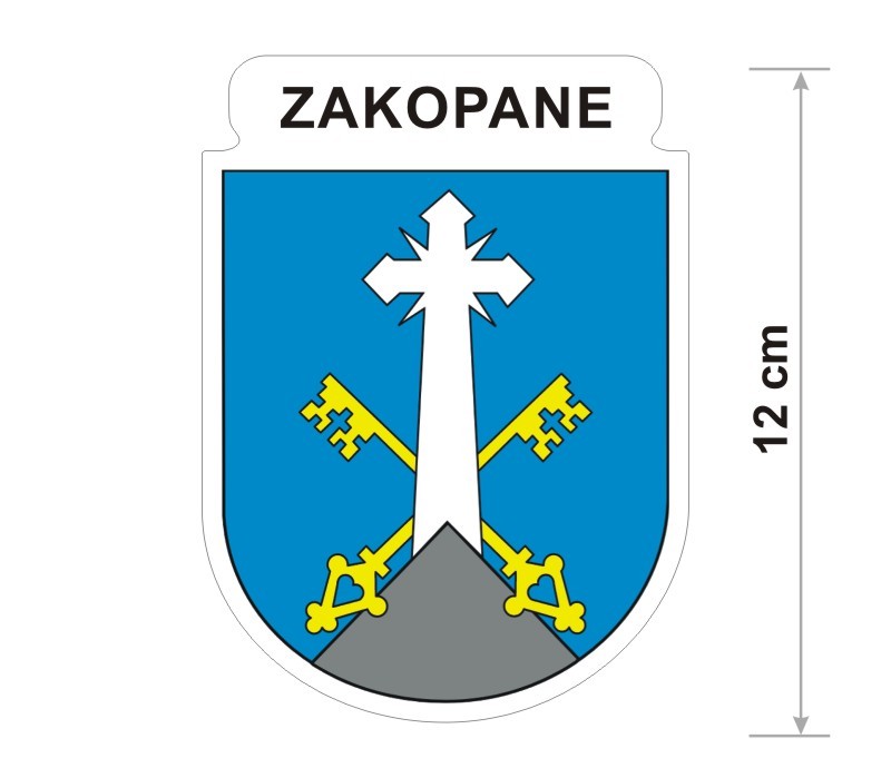 Naklejka z herbem Zakopanego, nad herbem jest umieszczony napis Zakopane. Herb wraz z nazwą otoczone są białą obwódką stanowiącą białe tło naklejki. Obok podano wymiar wysokości naklejki - 12 cm.
