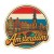 Naklejka Amsterdam z symbolami tego miasta, napisem Amsterdam i flagą Holandii w tle. Naklejka jest wodoodporna, okrągła i kolorowa z kremową obwódką.