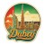 Naklejka Dubaju z symbolami tego miasta, napisem Dubaj i flagą Zjednoczonych Emiratów Arabskich w tle. Naklejka jest wodoodporna, okrągła i kolorowa z kremową obwódką.